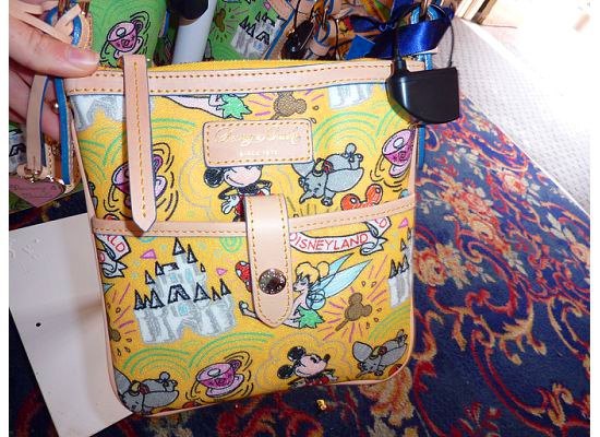 Disney Dooney and Bourke Yellow Letter Carrier